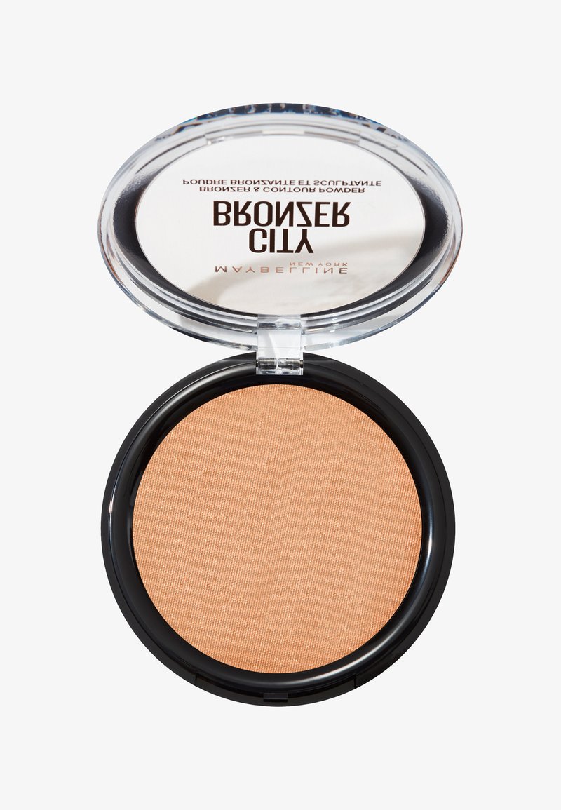 Ronde compacte bronzer met een gestructureerde lichtbruine poeder, verpakt in een transparante plastic case met een zwarte basis en een reflecterende deksel.