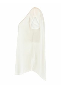 White short-sleeve top made from lightweight fabric, featuring a loose design with side slits, smooth texture, and a relaxed fit.