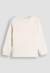 Helles beiges Langarmshirt mit Rundhalsausschnitt und weichem Material. Verfügt über gestickte Säume und ein schlichtes Design, ideal zum Kombinieren.