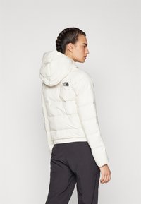 The North Face HYALITE DOWN HOODIE - Jakna ispunjena paperjem - white dune