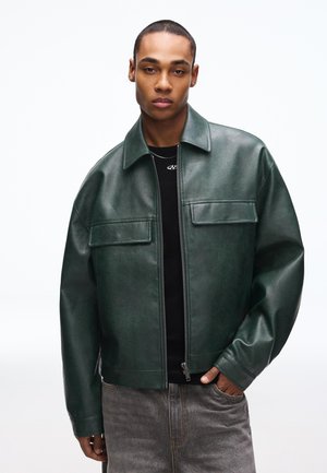 Bunda z nepravej kože - green