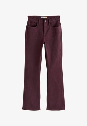 Sötét bordó színű bootcut farmer, elöl zsebekkel, övbújtatókkal és gombos rögzítéssel a derékrészen.