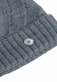 Berretto in maglia grigio con banda costellata e dettaglio circolare in argento con logo "BURLINGTON THE ORIGINAL." Tessuto lavorato in tutta la superficie.