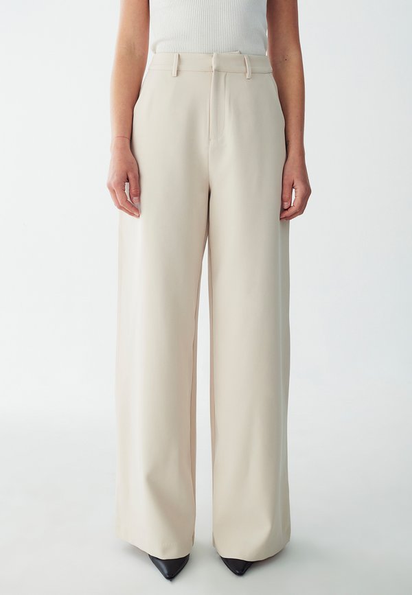 VANA  - Stoffhose - ecru