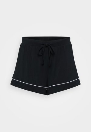Black relaxed-fit shorts made of soft fabric with a drawstring waist, featuring white piping along the hem for contrast.