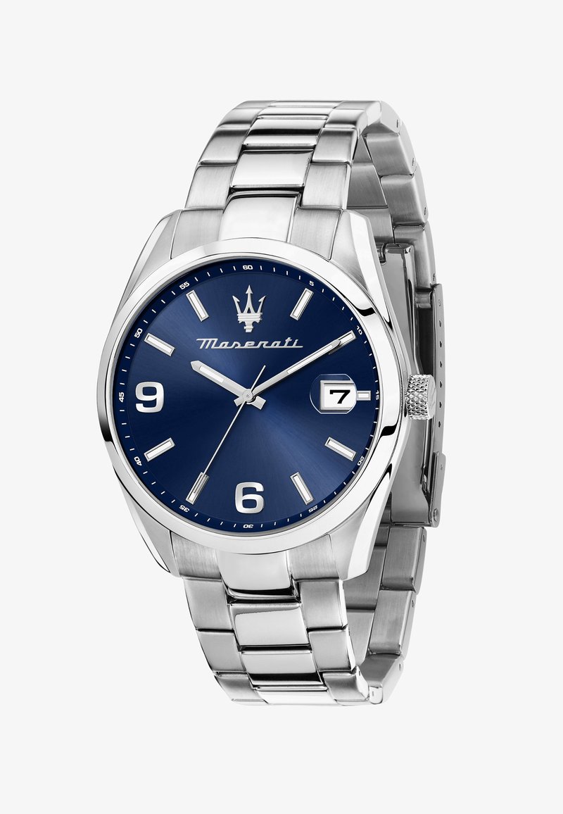 Analoge horloge met een band en kast van roestvrij staal. Blauwe wijzerplaat met zilveren uurmarkers, logo en een datvenster op de positie van 3 uur.