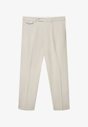 Pantalon beige clair sur mesure avec passants de ceinture, fermeture à boutons sur le devant, poches latérales et une petite poche à rabat du côté droit.