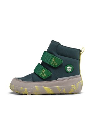 Child's high-top sneaker in dark green with two green Velcro straps featuring caterpillar icons and a gray sole with yellow accents.