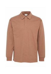 Langærmet polo skjorte i en lys brun farve, lavet af blødt stof med standard krave og knaplukning, med ribbede manchetter.