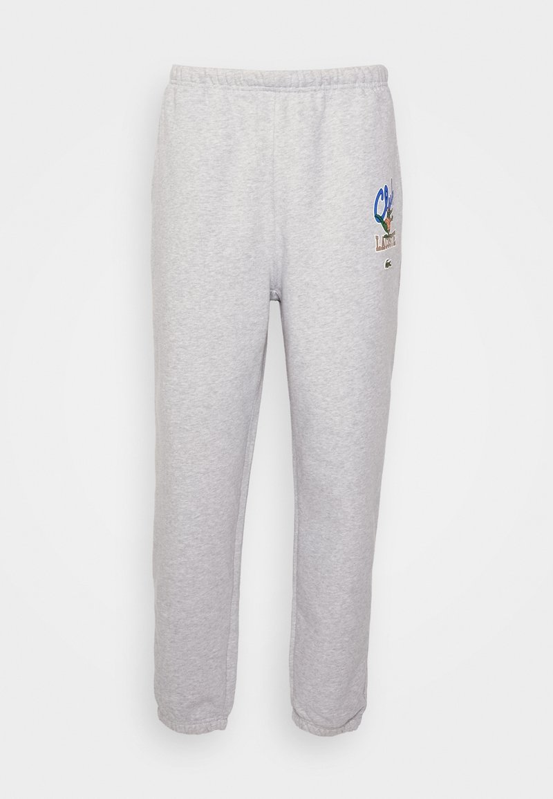 Grijze sweatpants met een elastische tailleband, taps toelopende pijpen en een kleurrijke geborduurde ontwerp met een logo op de bovenste linker dij.