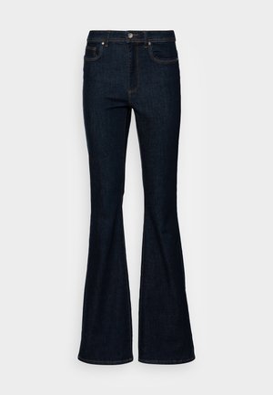Jeans de mezclilla acampanados de color azul oscuro con cierre frontal de botones, cinco bolsillos y costuras visibles en naranja sobre un fondo claro y liso.