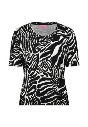 Black and white short-sleeve top featuring a zebra stripe pattern, crew neck, and smooth texture. Made from knit fabric.