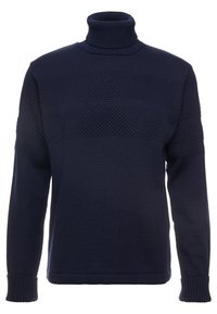 Maglione a collo alto blu navy con motivi testurizzati sul petto e sulle maniche. Realizzato in tessuto lavorato a maglia, con polsini e orlo a coste.