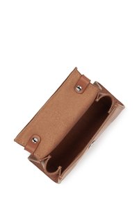 Brown leather wallet with open flap showing a single large compartment and snap button closures on a white background.