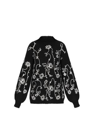 Črna svetra z zapleteno belo cvetličnim vezenjem. Ima dolge rokave, rebrast ovratnik in sproščen kroj. Teksturen pleteninski material.