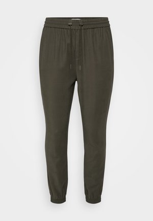 Dunkelgrüne Jogginghose mit einem Kordelzugbund, schmal zulaufenden Bündchen und einer glatten, leichten Stofftextur. Schlichtes und funktionales Design.