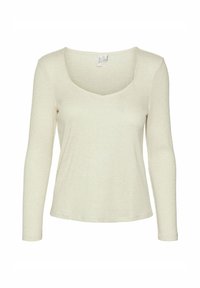 Maglietta a maniche lunghe di colore crema realizzata in tessuto a coste, con scollatura ampia e silhouette aderente. Superficie liscia in tutto il capo.