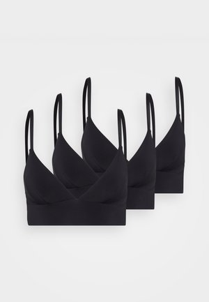 Zwarte bralettes met een v-halsontwerp, dunne verstelbare bandjes en zachte stof, gepresenteerd in een set van vier. Gladde textuur, naadloze afwerking.