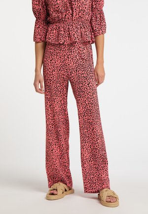 IZIA GAYA - Trousers - pink /schwarz