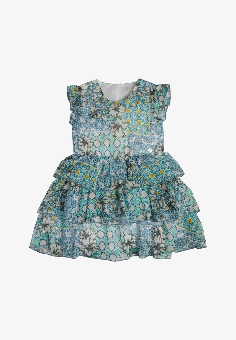 Robe sans manches à volants, avec un motif patchwork bleu, vert et jaune avec des motifs floraux et géométriques.