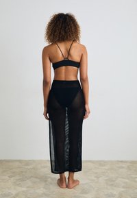 Calvin Klein Swimwear SKIRT - Complementos de playa - black