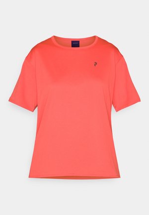 T-shirt corallo a maniche corte realizzato in tessuto liscio. Collo rotondo, con un piccolo logo nero sul petto. Vestibilità leggermente ampia.