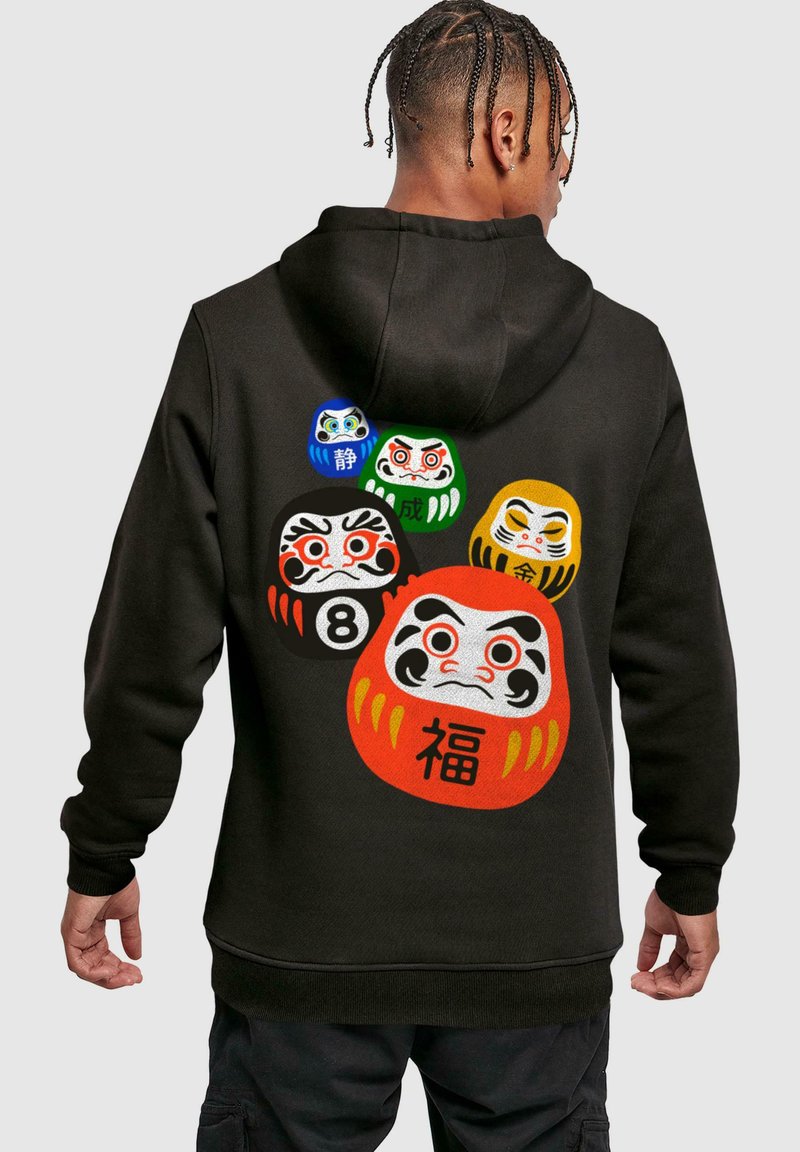 Black hoodie featuring colorful Daruma doll designs on the back. Designs include red, yellow, green, and blue details with unique facial expressions.