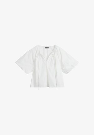 Witte losse blouse met korte mouwen, V-hals en koordjes bij de halslijn, gemaakt van lichtgewicht stof.