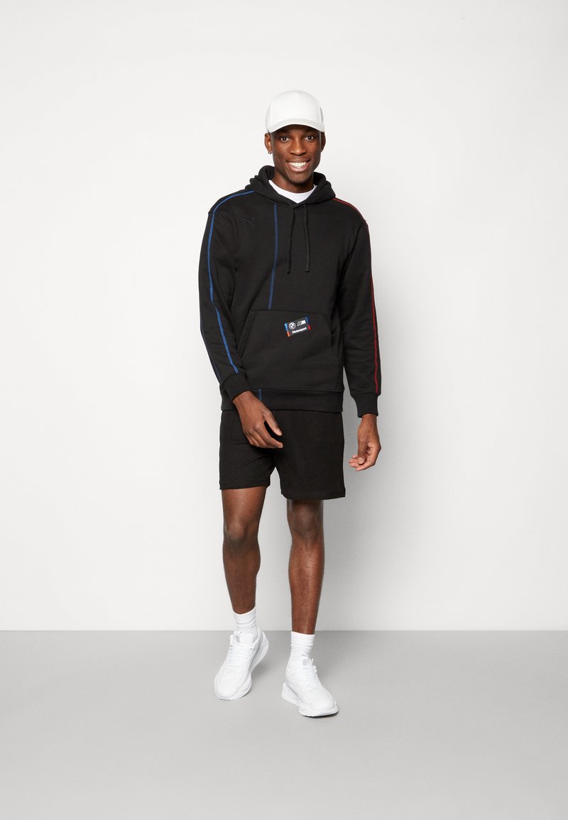 STATEMENT HOODIE - Sudadera - puma/negro - Zalando.es