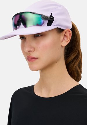 Light purple cap with a curved brim, featuring a black accent. Mirrored sunglasses with green and blue tints. Worn with a black shirt.