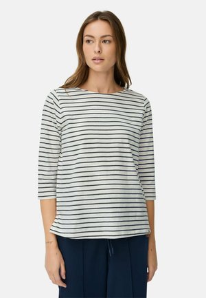 Striped long-sleeve top in light gray with navy stripes, round neckline, and three-quarter sleeves. Soft fabric, relaxed fit.