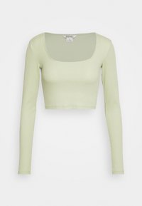 Top cropped de manga longa em tecido canelado verde claro. Apresenta um decote quadrado largo e um design ajustado com uma textura suave.
