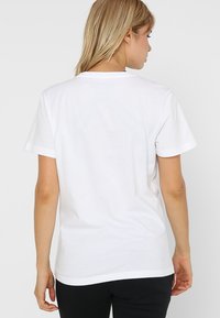 Helly Hansen HH LOGO - Camiseta estampada - white