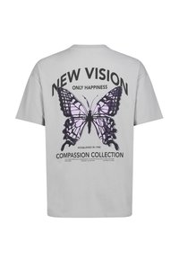 Gray cotton t-shirt featuring a large purple butterfly graphic with text. Back design includes "NEW VISION" and "COMPASSION COLLECTION" details.