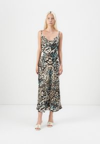Satin midi dress with a leopard print in brown, beige, and teal. Features thin straps and a scoop neckline. Soft, flowing fabric.