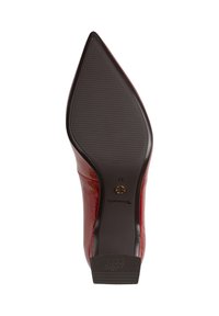 Semelle d'une chaussure à talon aiguille rouge pour femmes, avec une semelle en caoutchouc texturée, taille 37, et caractéristiques antidérapantes.