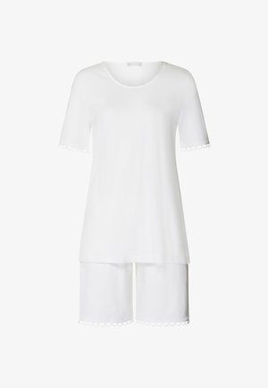 Set di loungewear in cotone bianco composto da un top a maniche corte con orlo smerlato e pantaloni shorts abbinati con bordi smerlati. Tessuto morbido.