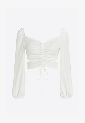 Top corto bianco con maniche lunghe a sbuffo, design frontale arricciato e coulisse in vita, realizzato in tessuto leggero e liscio.