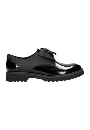 Black patent leather shoe with a rounded toe, decorative bow on the vamp, and a textured rubber sole featuring traction patterns.