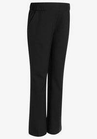 Pantaloni neri con un design a gamba larga, realizzati in tessuto morbido. Presentano una vita elastica e tasche laterali per la funzionalità.
