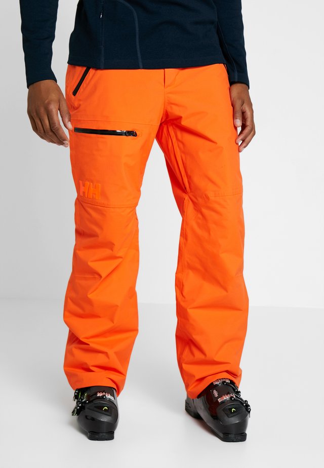 SOGN CARGO PANT - Pantalon de ski - bright orange
