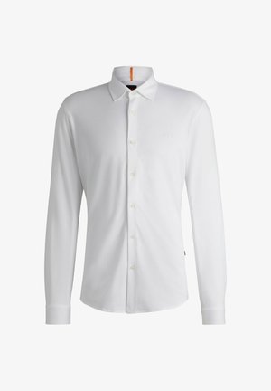 Bílá košile s dlouhým rukávem z měkké bavlny, s límečkem na knoflíky, předním zapínáním na knoflíky a malým logem na hrudi.
