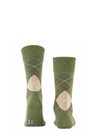Calze verdi con polsino a coste, caratterizzate da un motivo argyle beige e accenti bianchi. Realizzate in tessuto a maglia testurizzato.