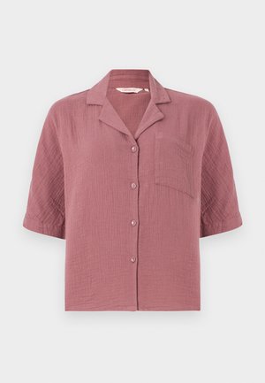 Cămașă cu mâneci scurte, culoare roz prăfuit, cu nasturi, guler și un buzunar pe piept, realizată dintr-un material texturat.