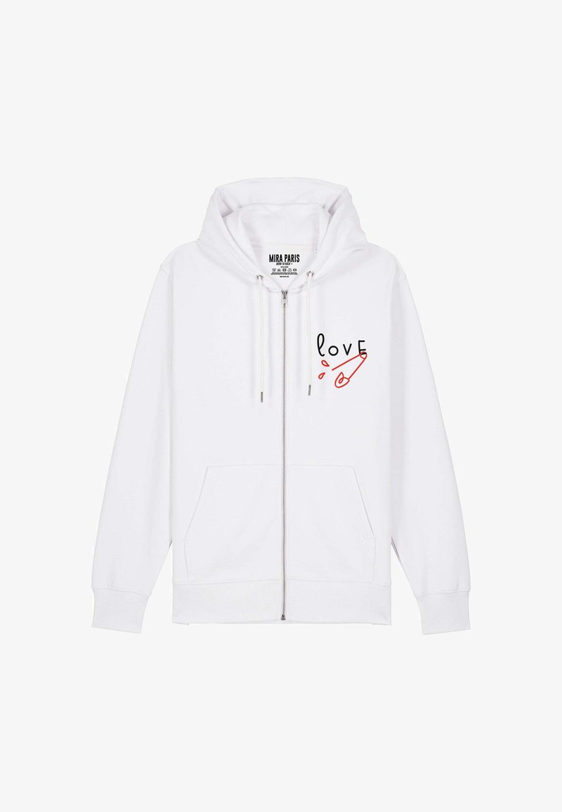 Felpa bianca con zip in cotone, dotata di due tasche frontali e un design grafico "love" con un accento a forma di spilla di sicurezza rossa sul lato sinistro.