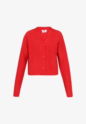 Sarkans adīts kardigans ar V-veida kaklu, garām piedurknēm un kabelīšu adījumu rakstu. Tam ir trīs spilgti sarkanas pogas un īsa piegriezuma forma.