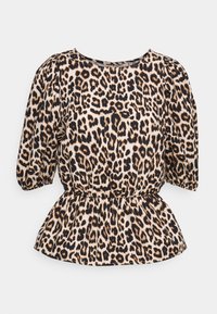 Blus i leopardmönster i beige med svarta och bruna fläckar. Har korta puffärmar och peplum i midjan. Mjukt tyg.