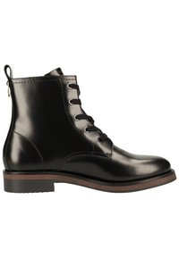 Bottine en cuir noir poli avec lacets noirs, semelle bordée de marron, et languette à l'arrière, vue de profil.