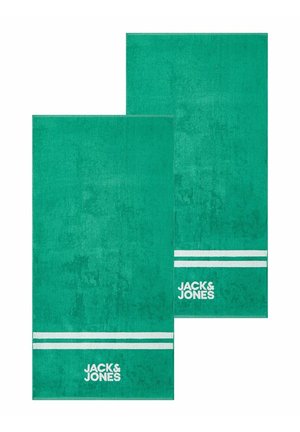 Two green rectangular towels with white double stripes near the edge and "JACK & JONES" logo printed below the stripes.