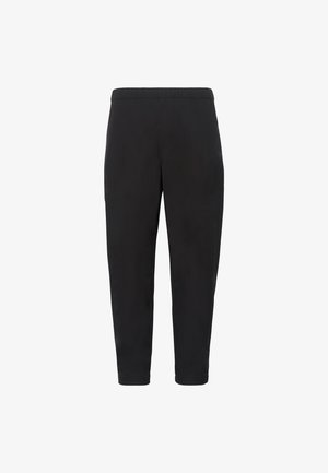 Pantalon noir fuselé avec taille élastique, poches latérales et coupe à la cheville présenté sur fond blanc.